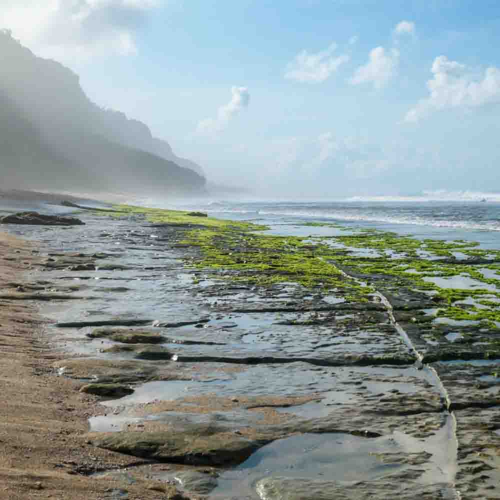 destinasi wisata bali 2026 Pantai Nyang Nyang Uluwatu hidden gem dengan pasir putih panjang